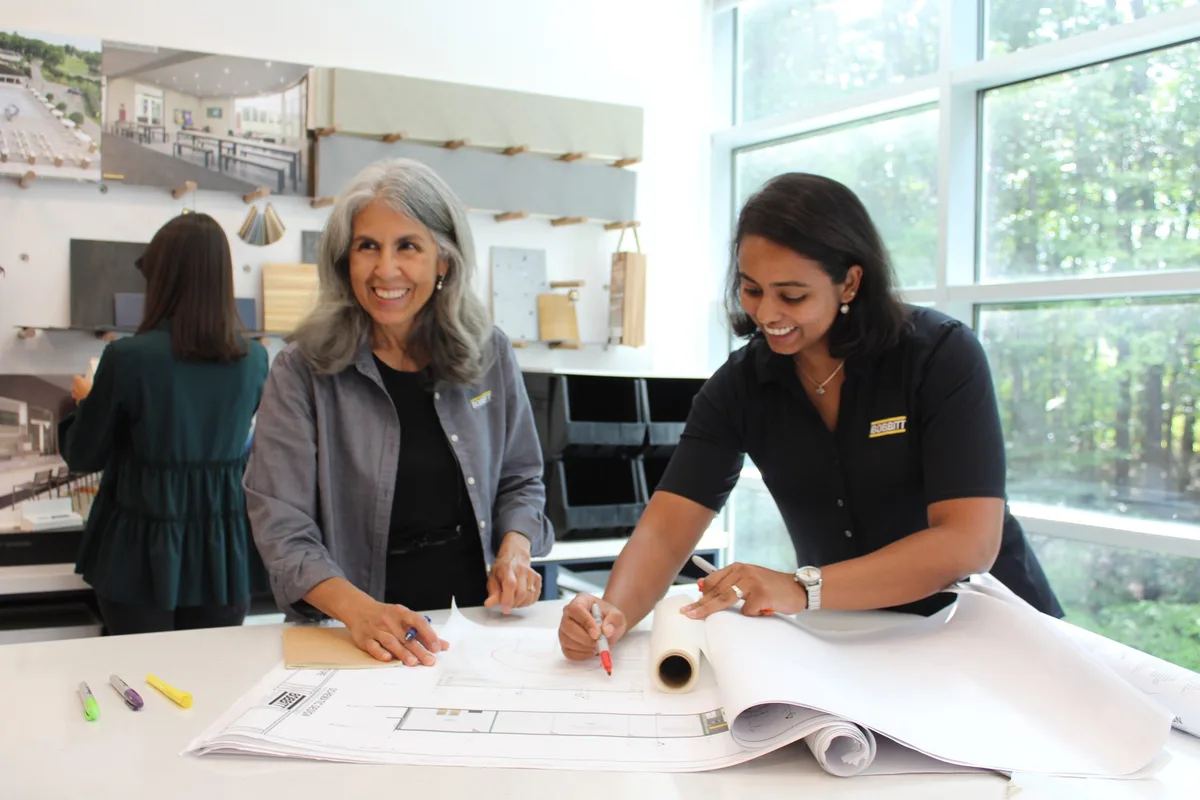 Bobbitt design team reviewing plans and finish samples